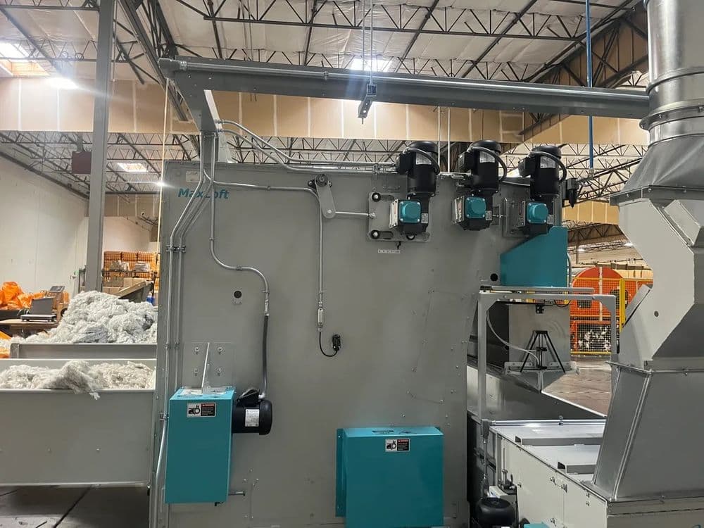 Industrial textile processing machine with multiple motors and ventilation system.