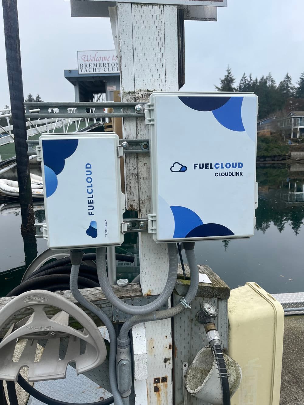FuelCloud CloudLink device mounted on dock post for efficient fuel management and monitoring.